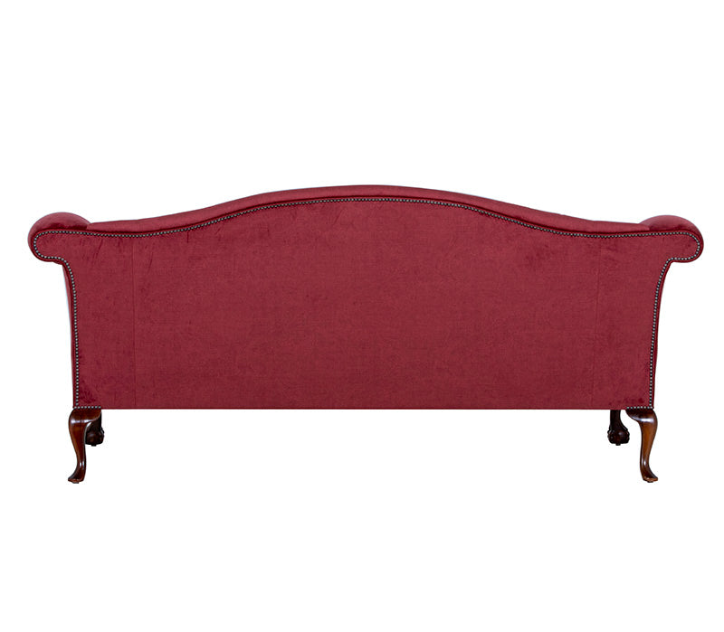 Back of red sofa with nailing