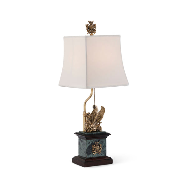 Brass griffin and mahogany table lamp