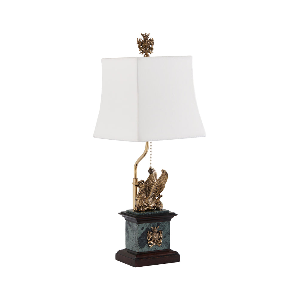 Brass griffin and mahogany table lamp