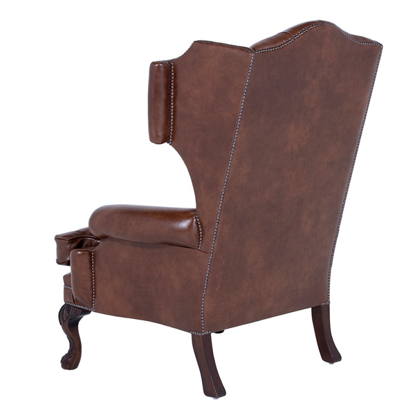side of a buttoned back wingchair by brights of nettlebed