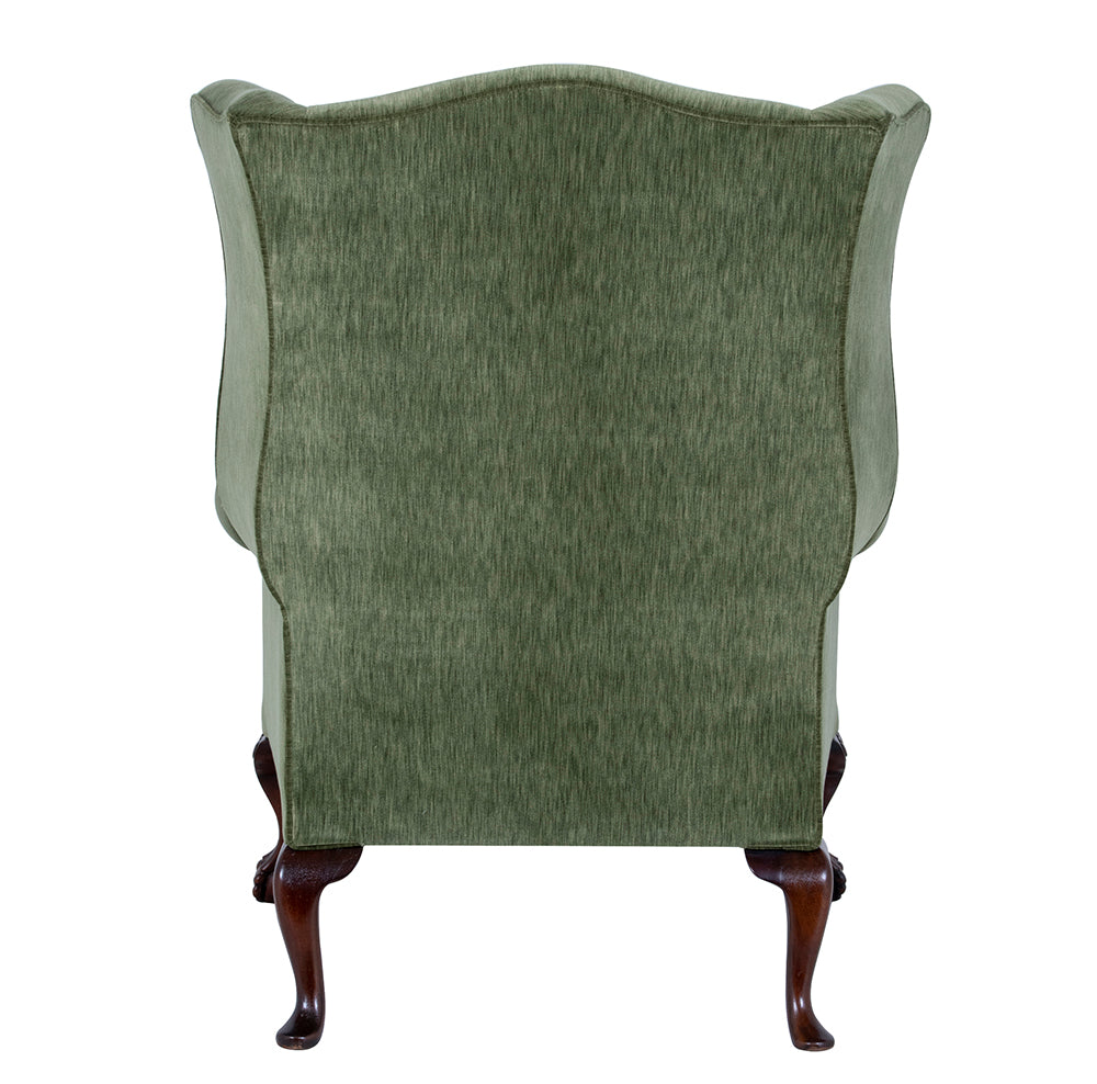 back of green wingchair