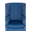close up shot of fluted blue wingbacked chair from brights of nettlebed