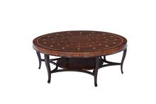 Round wooden table with intricate design on a white background
