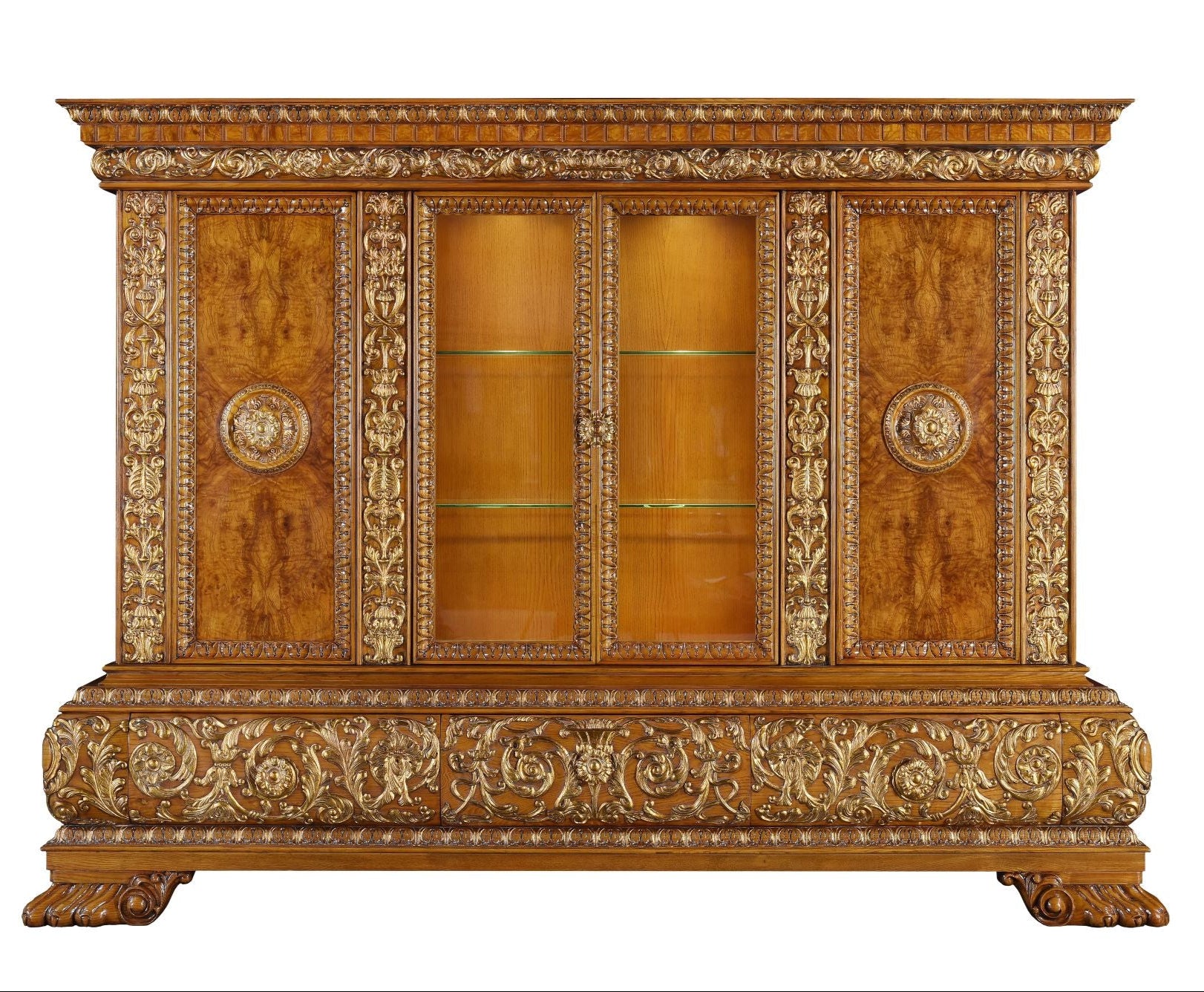 Decorative wooden cabinet with gold embellishments on a white background