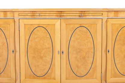 Serpentine Sycamore Four Door Cabinet