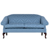 a blue traditional english sofa