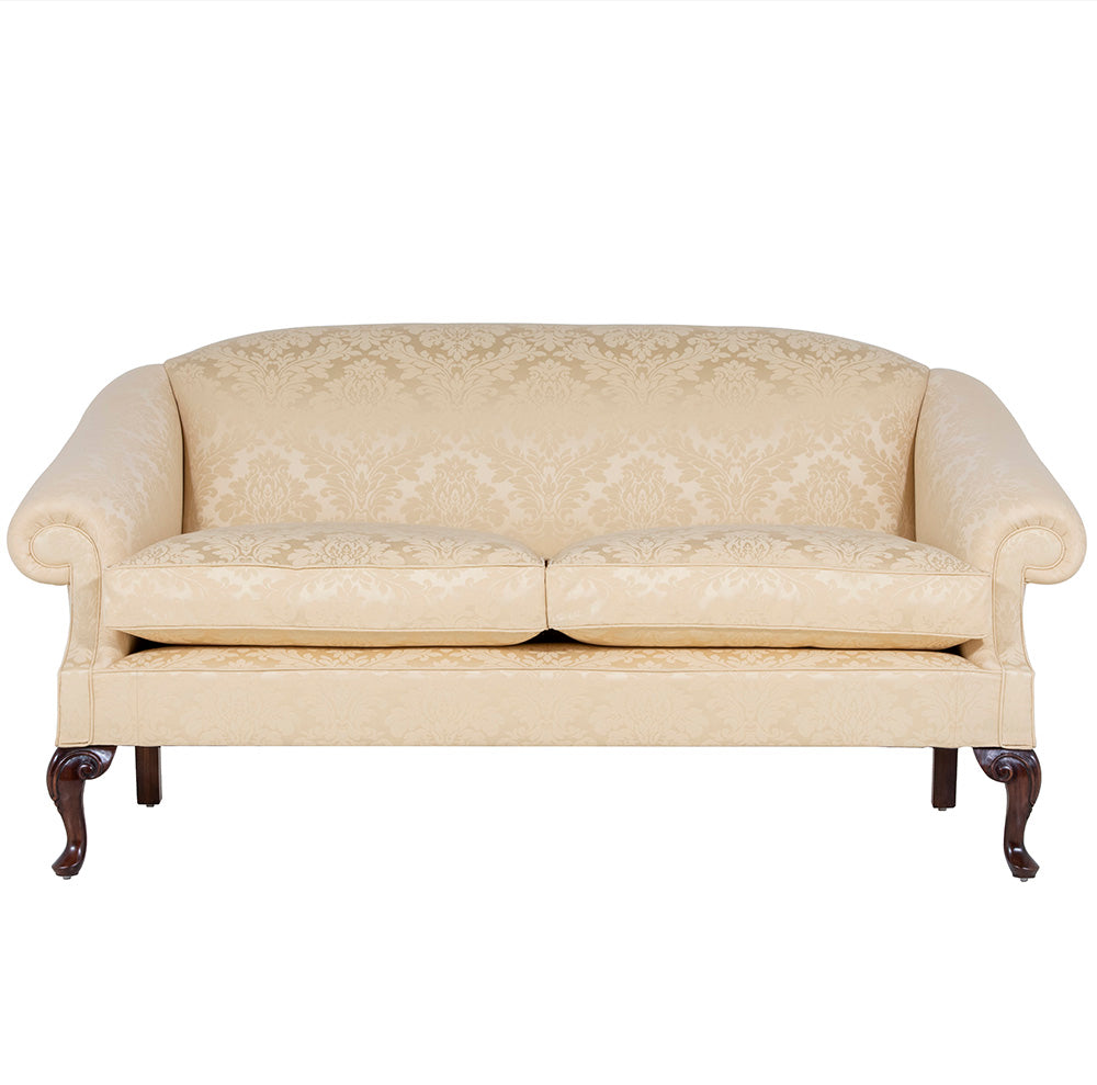 A yellow damask traditional english sofa