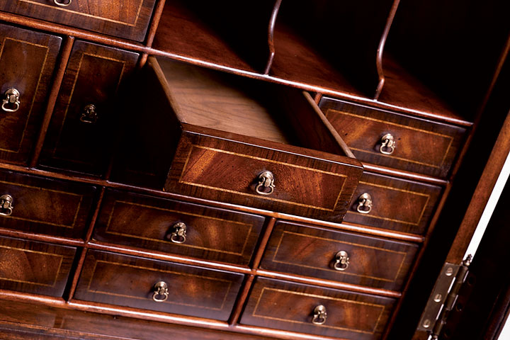 The mahogany one hundred drawer bureau