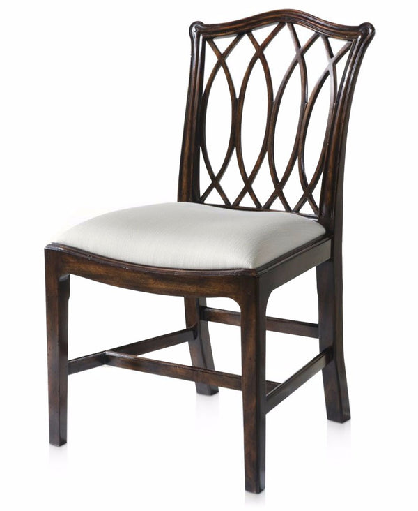 Serpentine pierced dining chair