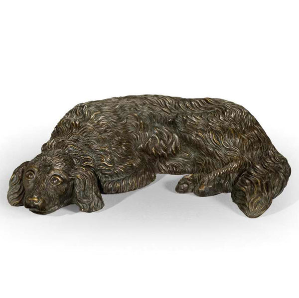 Bronze model of a lying dog
