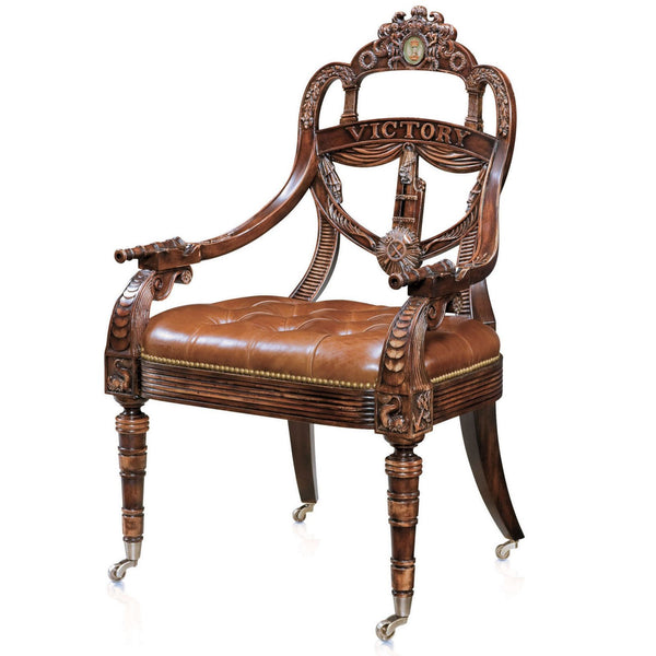 Hand carved mahogany library armchair