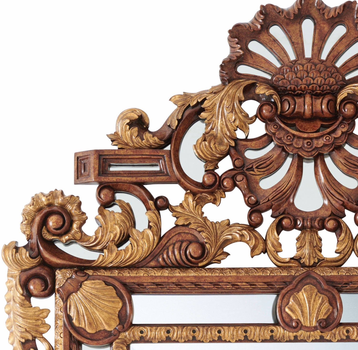 A carved wood and parcel gilt mirror