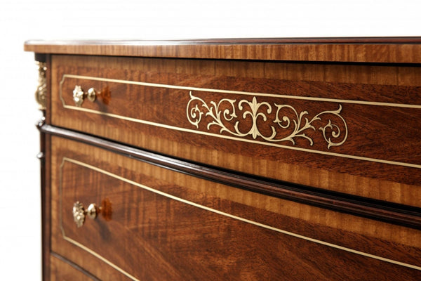 Brass inlaid serpentine chest of drawers