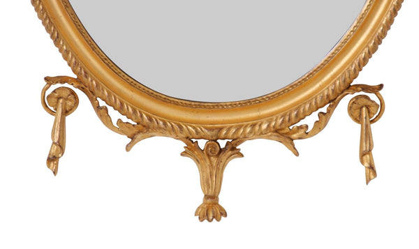 Water gilded oval mirror with bell flowers