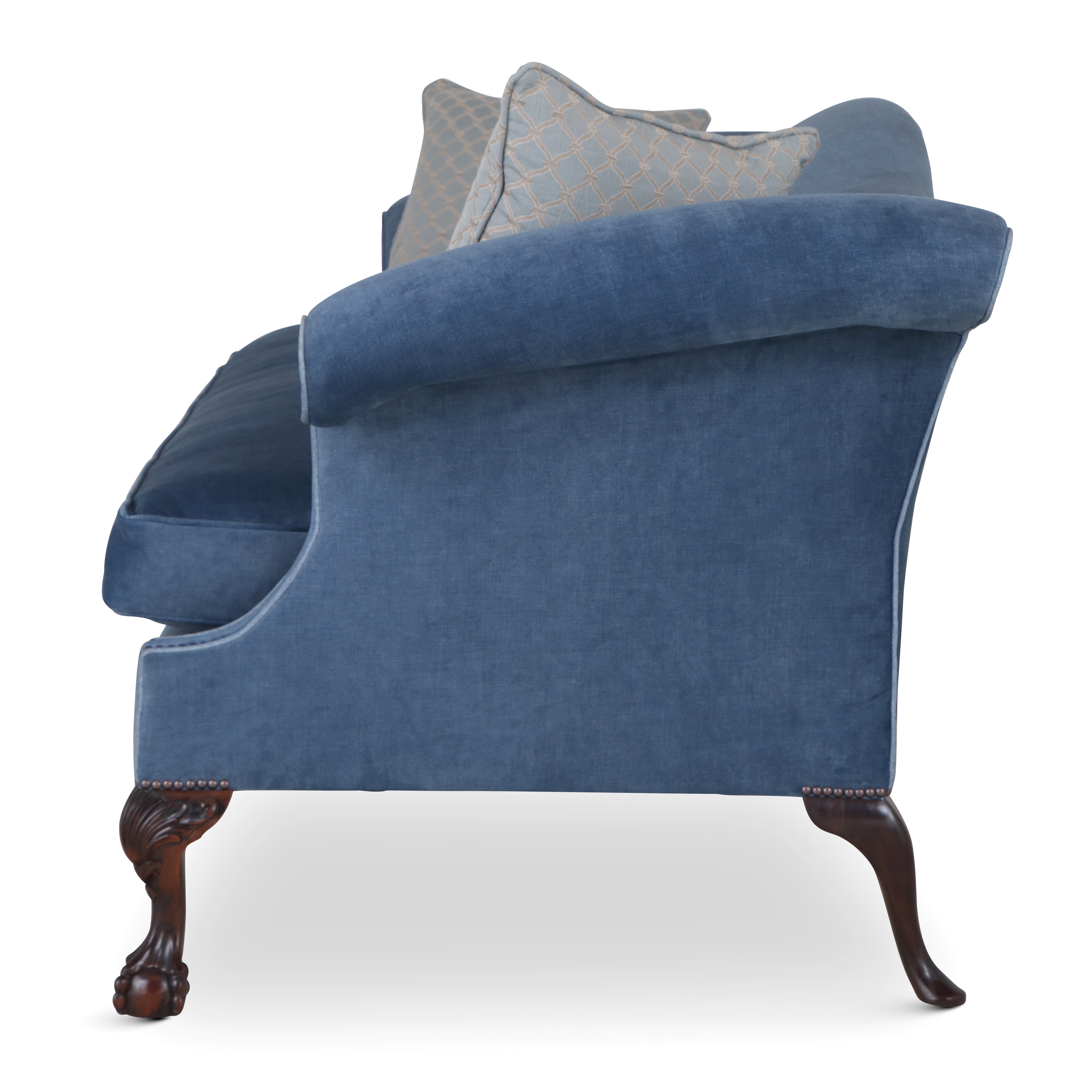 Side and arm of blue sofa