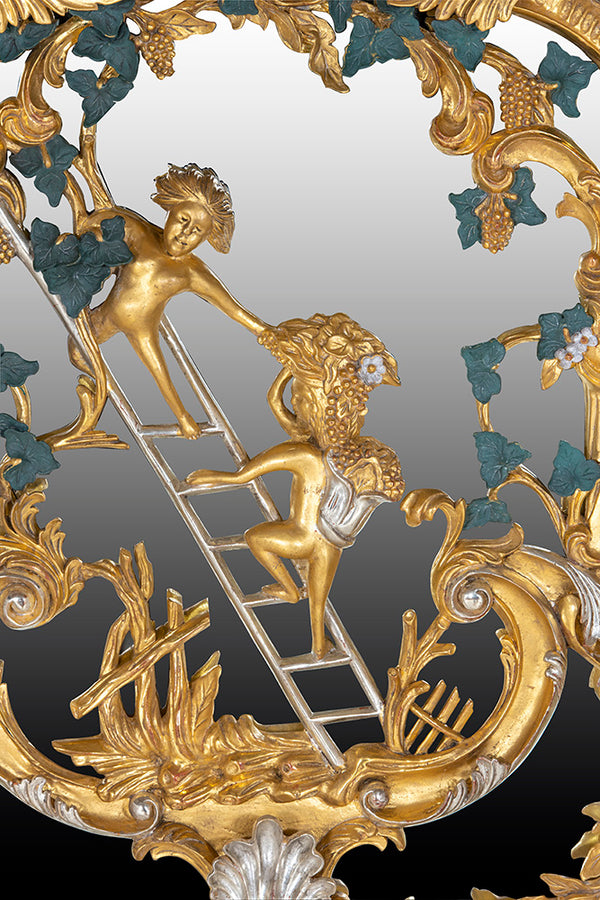 Thomas Johnson style mirror water gilded in 23 ¾ carat gold leaf with a custom paint finish